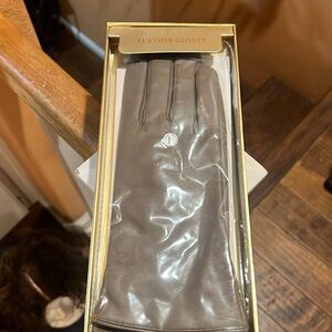 Soft Leather Gloves with warm material to keep those hands warm.